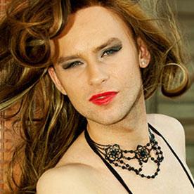 Illustrative photo of a crossdresser wearing a black beaded choker. Not an actual member.